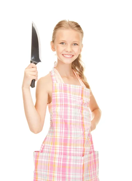 Malá hospodyňka s nožem — Stock fotografie