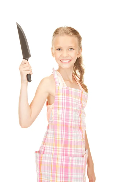 Pequena dona de casa com faca — Fotografia de Stock