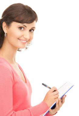 Young attractive businesswoman with notebook clipart