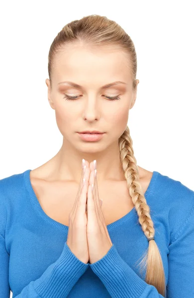 Praying businesswoman Stock Image