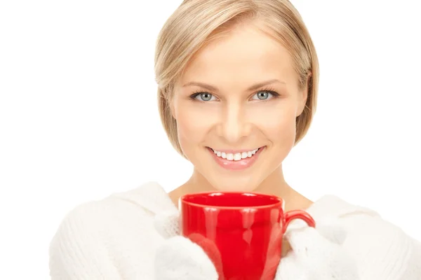 Beautiful woman with red mug — Stock Photo, Image