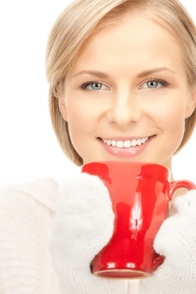 Beautiful woman with red mug — Stock Photo, Image