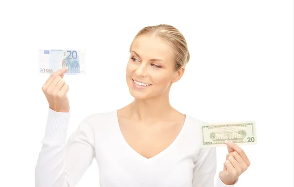 Kobieta z euro i Dolar notatki pieniądze — Zdjęcie stockowe