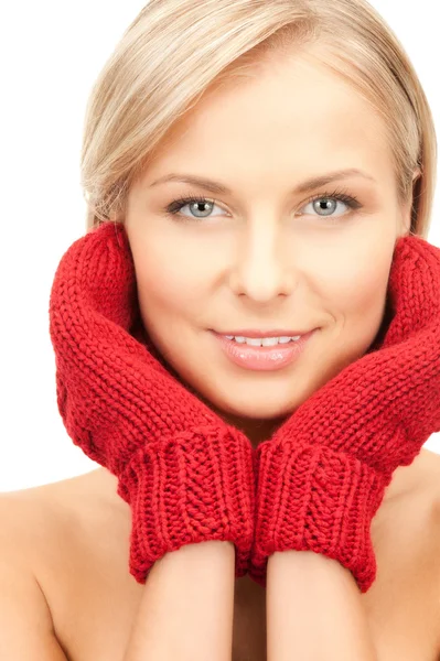 Beautiful woman in red mittens — Stock Photo, Image