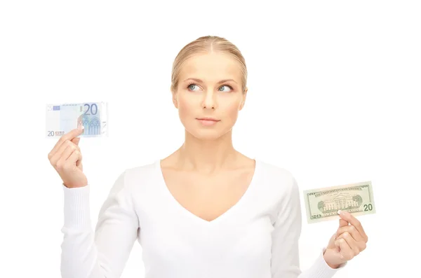 Mujer con billetes en euros y dólares —  Fotos de Stock