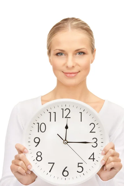 Woman holding big clock Stock Picture