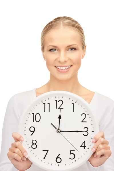 Woman holding big clock Royalty Free Stock Images