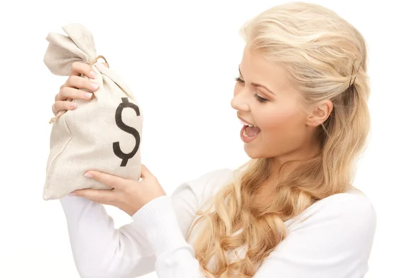 Woman with dollar signed bag — Stock Photo, Image
