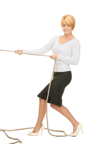 Business woman pulling rope — Stock Photo, Image
