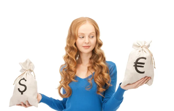 Femme avec des sacs euro et dollar — Photo