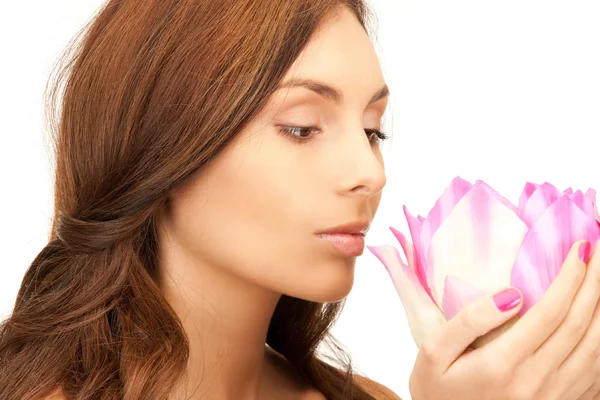 Beautiful woman with lotus flower — Stock Photo, Image