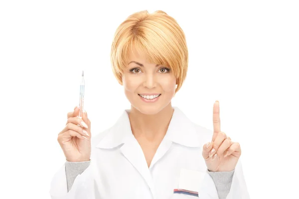 Atraktivní ženské doktor s teploměrem — Stock fotografie