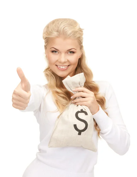 Woman with dollar signed bag — Stock Photo, Image