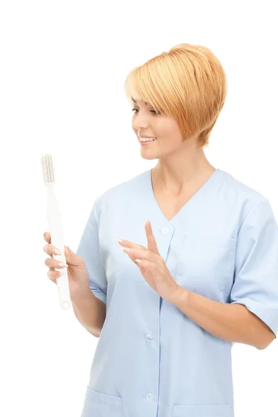 Arts met een tandenborstel — Stockfoto