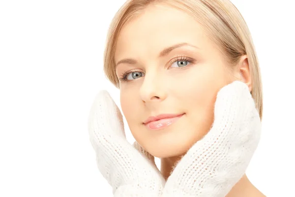 Beautiful woman in white mittens — Stock Photo, Image