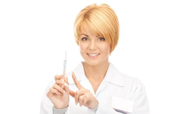 Aantrekkelijke vrouwelijke arts met thermometer — Stockfoto