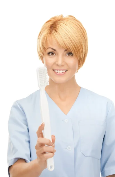 Arts met een tandenborstel — Stockfoto