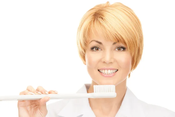 Çekici Kadın Doktor Diş Fırçası Ile Resmi — Stok fotoğraf