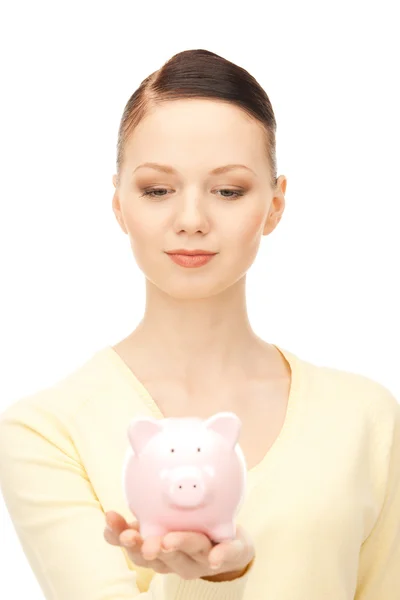 与猪存钱罐可爱的女人的图片 — 图库照片