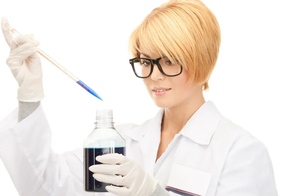 Lab worker holding up test tube — Stock Photo, Image