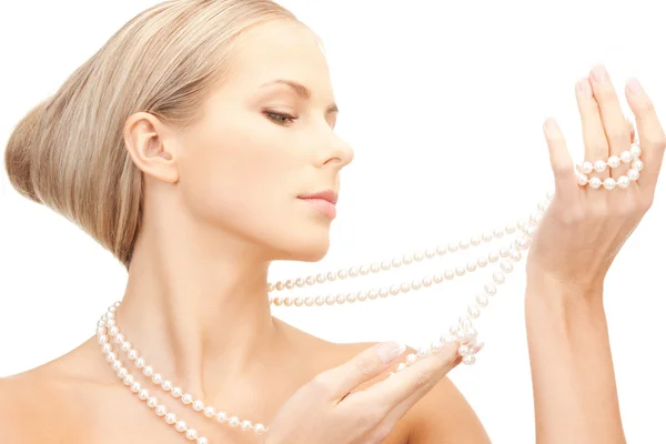 Beautiful woman with pearl beads — Stock Photo, Image