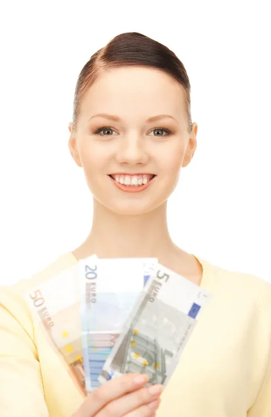 Mujer encantadora con dinero en efectivo en euros Imágenes de stock libres de derechos