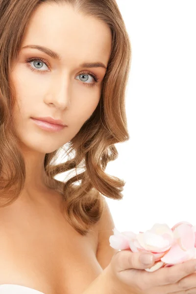 Beautiful woman with rose petals — Stock Photo, Image
