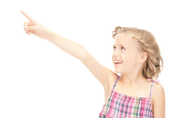 Kleines Mädchen zeigt mit dem Finger — Stockfoto