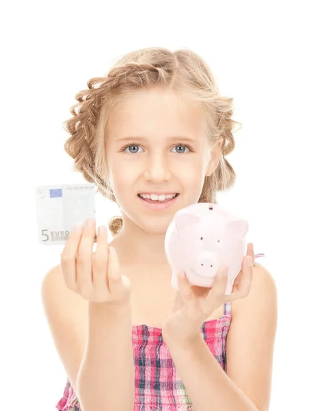 小女孩与小猪银行和钱 — 图库照片