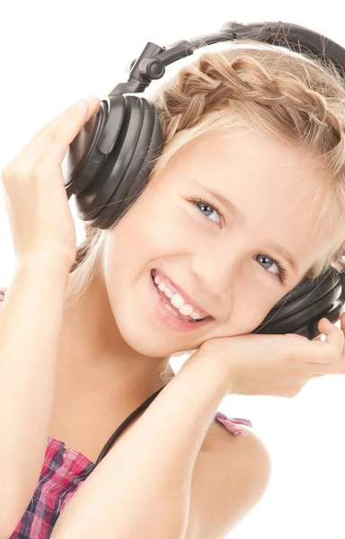快乐的女孩在大耳机 — 图库照片
