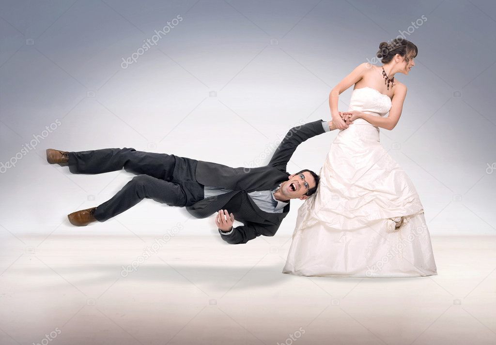 Bride abusing groom, isolated on white