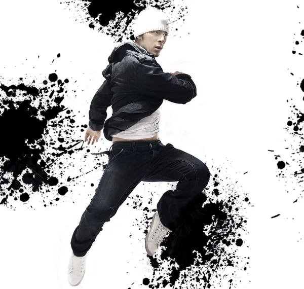 Hip Hop bailarina saltando, sobre fondo de salpicadura abstracta — Foto de Stock