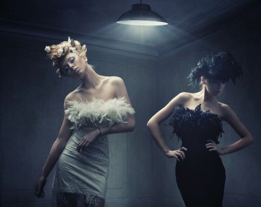 Vogue style photo of two fashion ladies