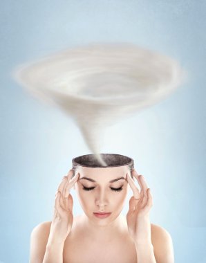 Conceptual picture - tornado in woman's head clipart