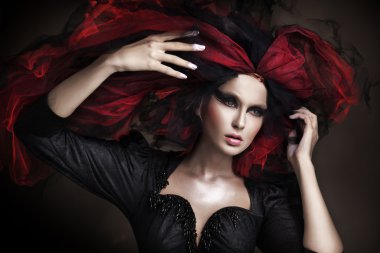 Portrait of beautiful girl with dark make up and amazing style clipart