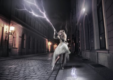 Stylish woman catching thunderbolts clipart
