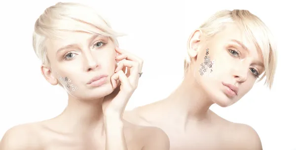 Due donne carine con stelle sul viso — Foto Stock