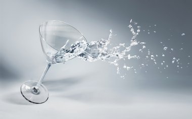 Glass of water and ice on a nice background clipart