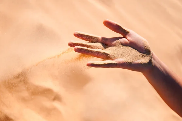 Wind takes down send from the hand — Stock Photo, Image