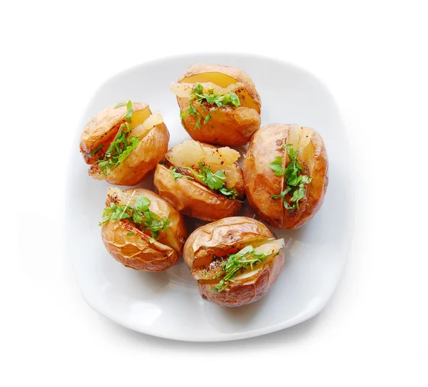 Baked potatoes with bacon and herbs — Stock Photo, Image