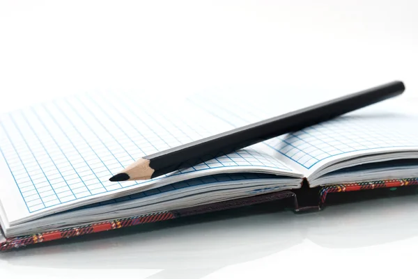 stock image Close up of notebook and pencil