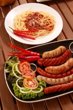 Pasta spicy and sausage. clipart