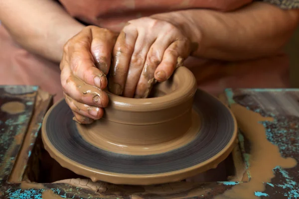 stock image Potter creates a pitcher on a pottery wheel