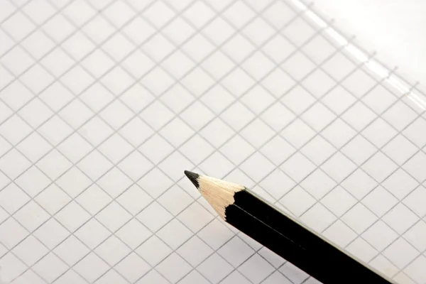 Kvadrat sida och penna — Stockfoto