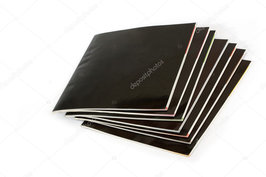 Stack of black covered magazines