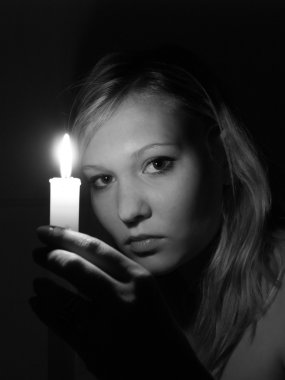 Girl with candle clipart