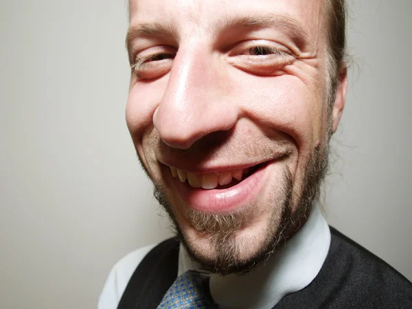 stock image Funny smile of a young businessman