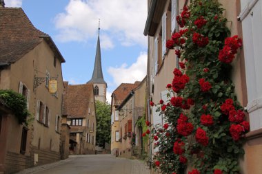 Village lane with church clipart