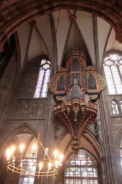 Candleholder and organ of Strasbourg cathedral — Stock Photo, Image