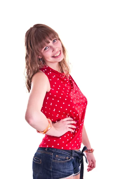 Женщина в краснопятнистой блузке — стоковое фото